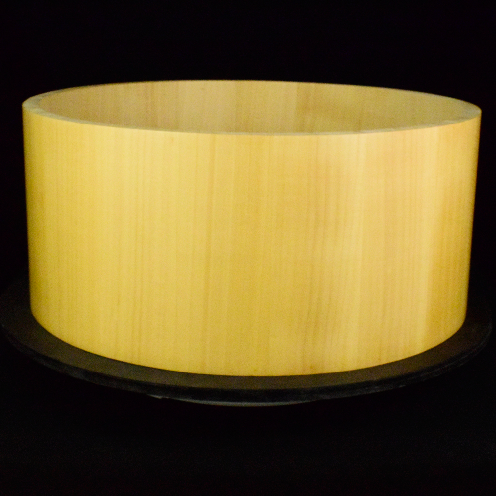 Snare drum shell made from maple staves