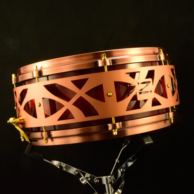 Red sunburst Maple stave shell snare with copper die-cast hoops, gold hardware