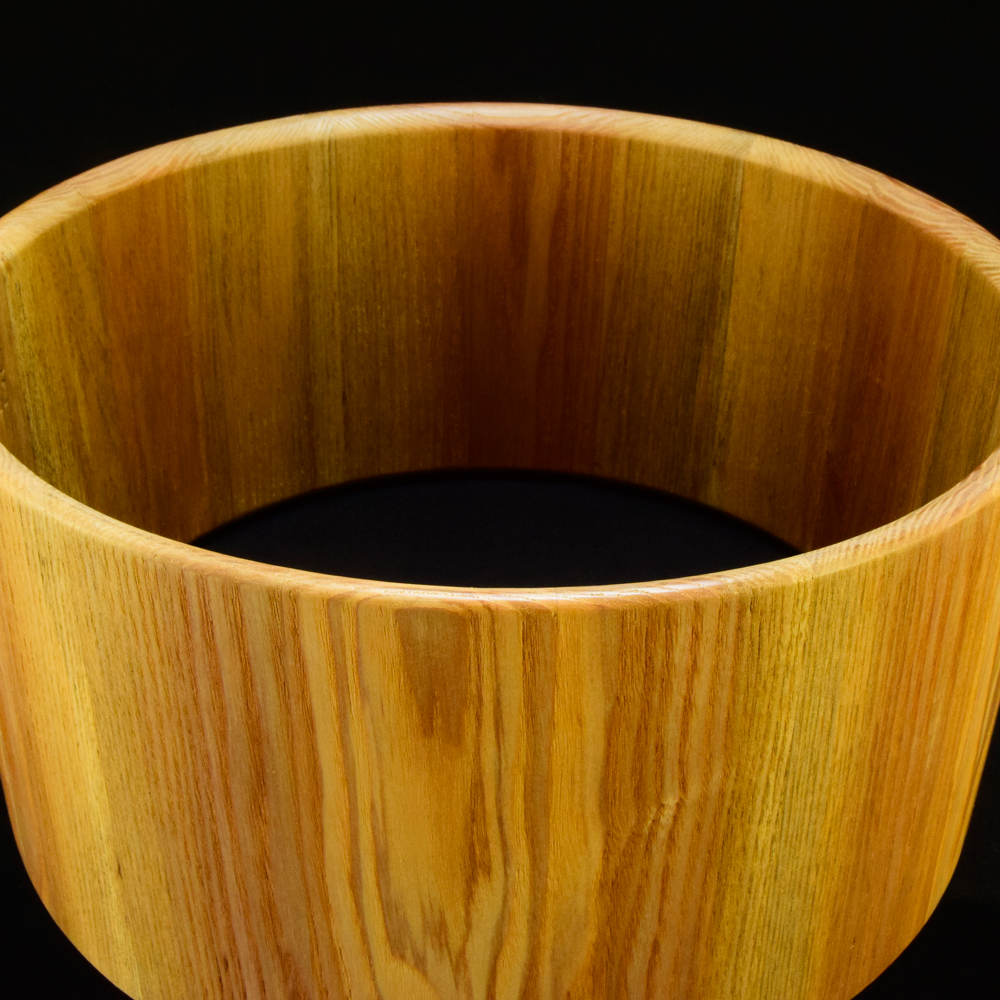 Ash stave shell with bearing edges and two side air vents