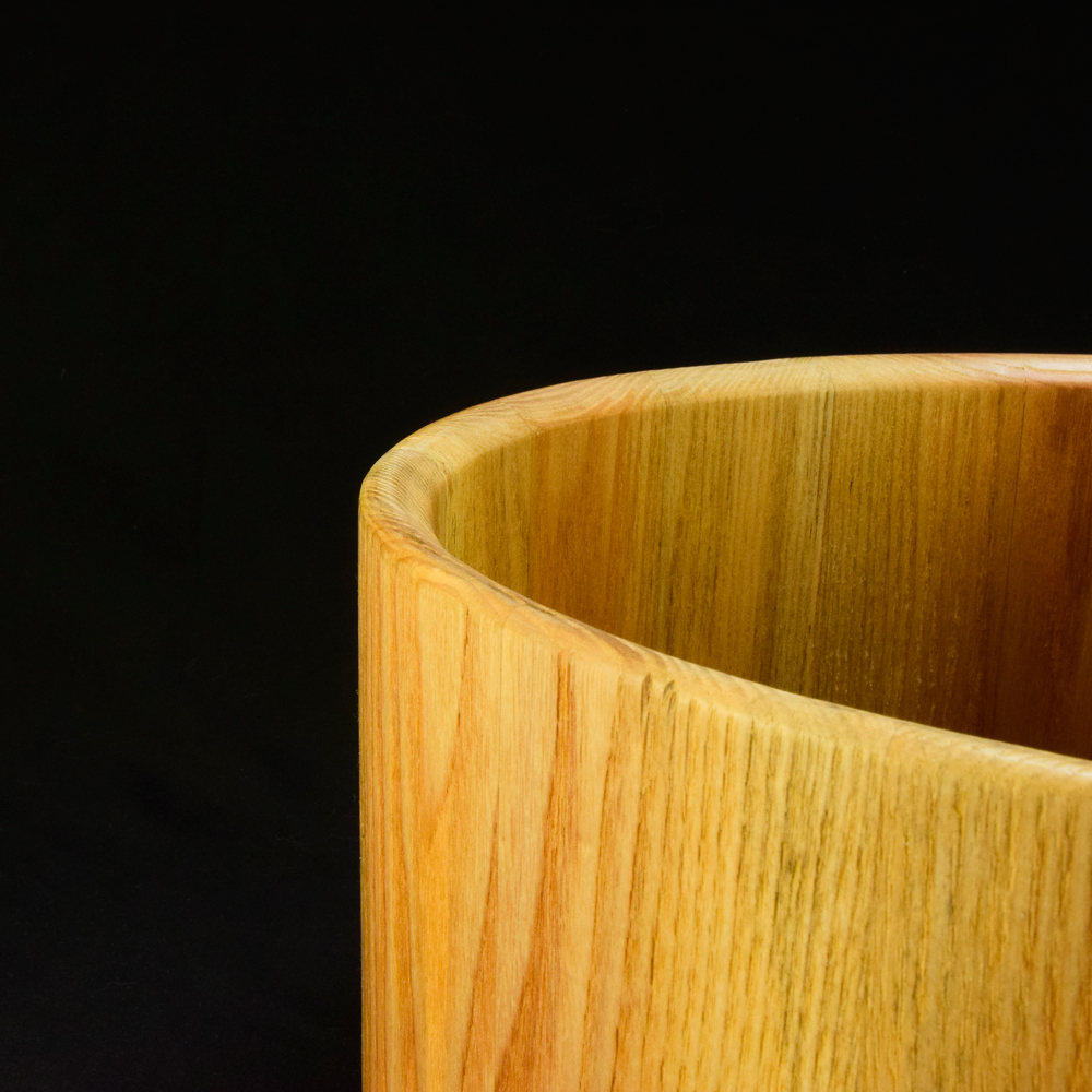 Ash stave shell with bearing edges and two side air vents